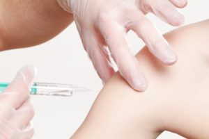Vaccination Incentives & Penalties: Caroming into the COVID Kulturkampf